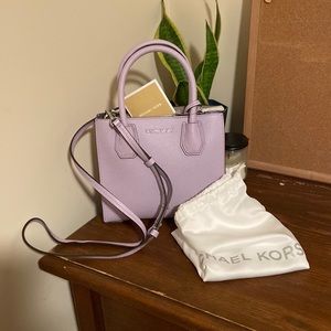 Never used Michael Kors Mercer MD Messenger Handbag color- lilac
